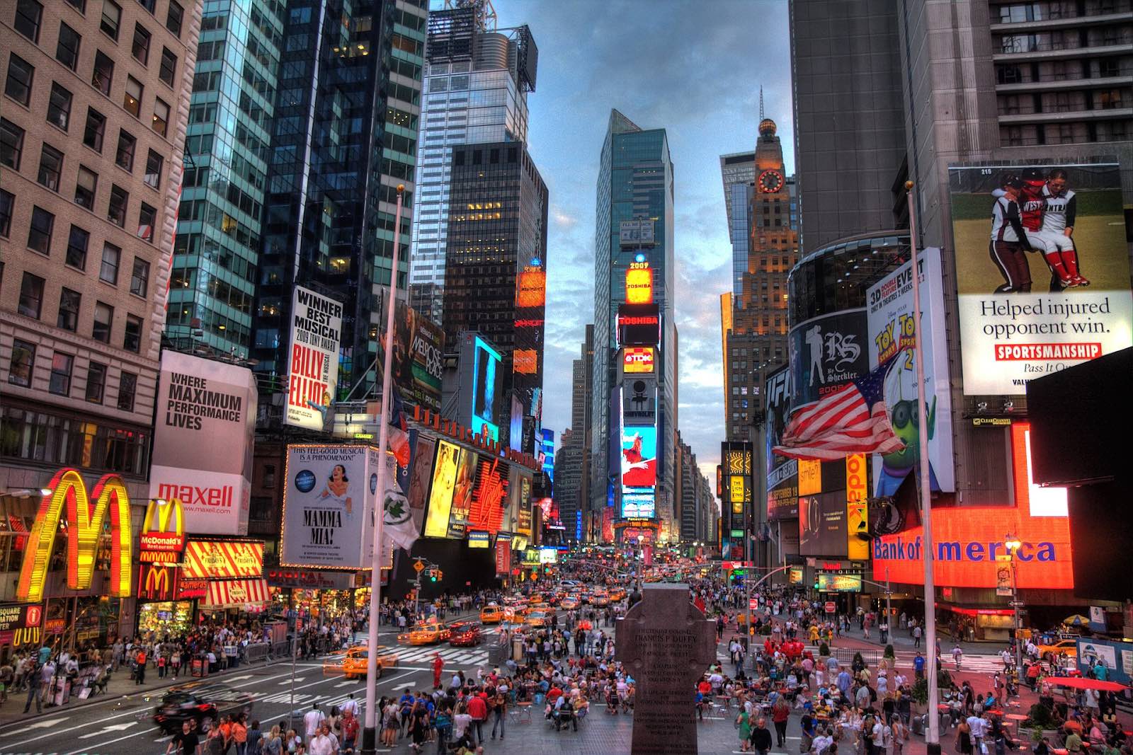 Multiple print and digital billboards seen in Times Square, New York.